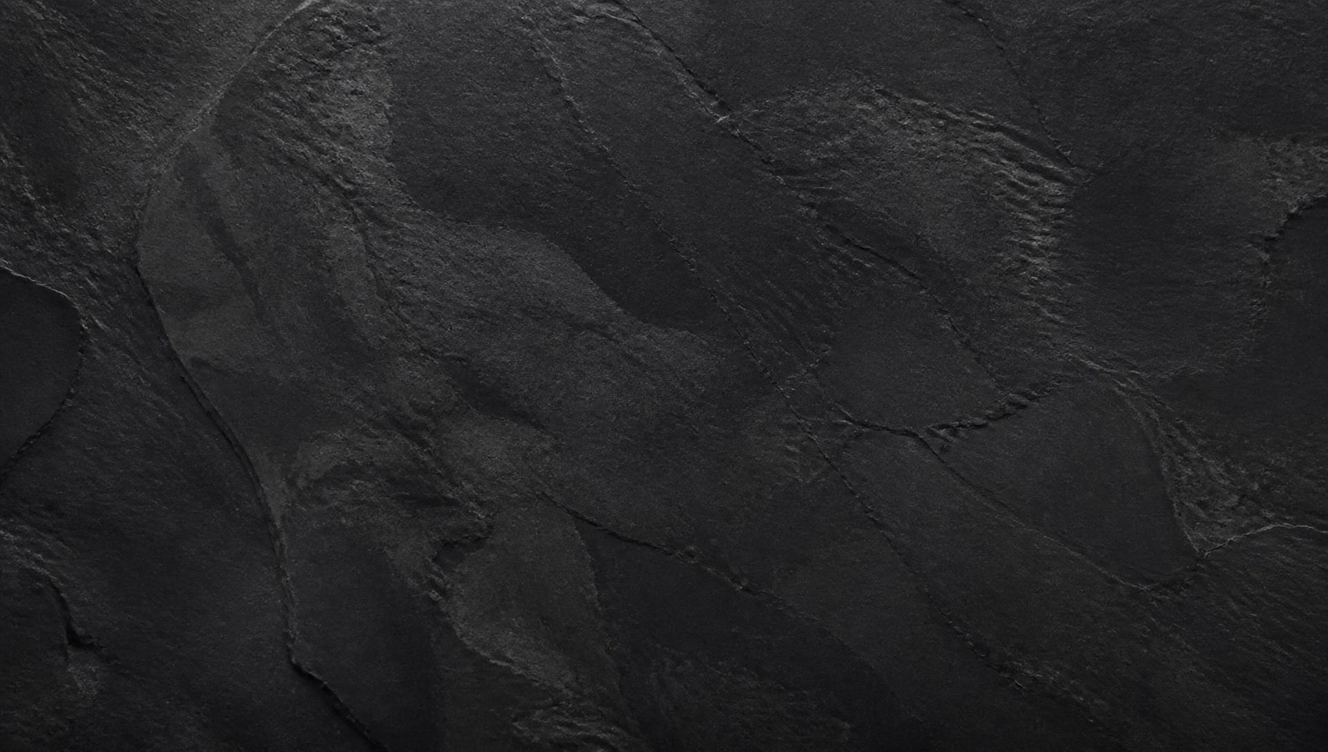 Textured charcoal stone background